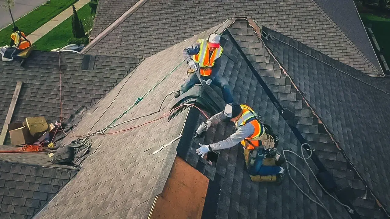 Expert roofing team installing new roof